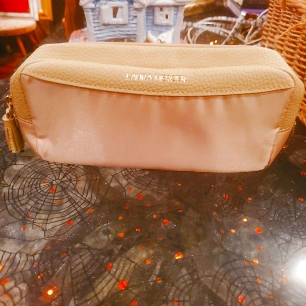 Laura Mercier cosmetic bag.